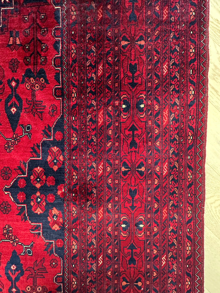 Afghan handmade extremely fine quality with 100 percent Belgian wool. Size: 2.93x2.0 m