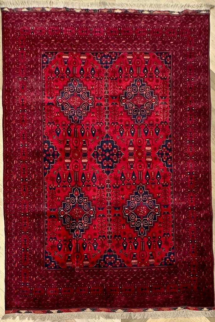Afghan handmade extremely fine quality with 100 percent Belgian wool. Size: 2.93x2.0 m