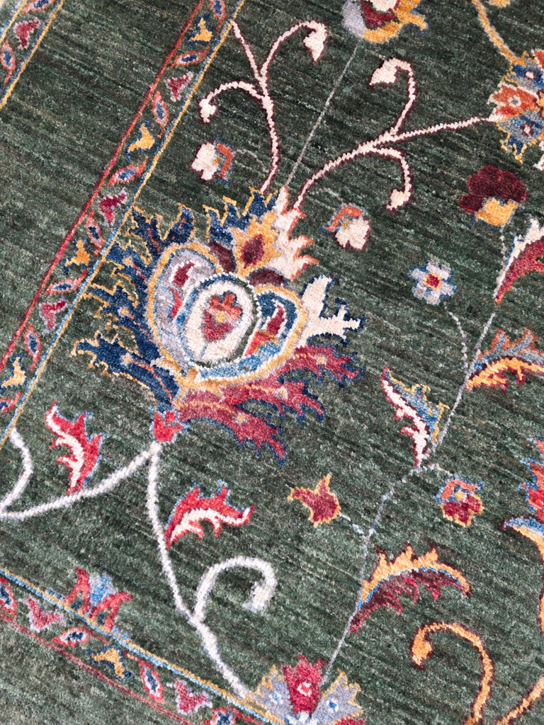 Forest green Afghan handmade floral wool rug detail 2