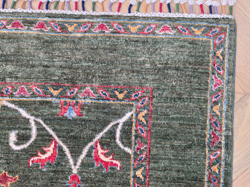 Forest green Afghan handmade floral wool rug detail 6